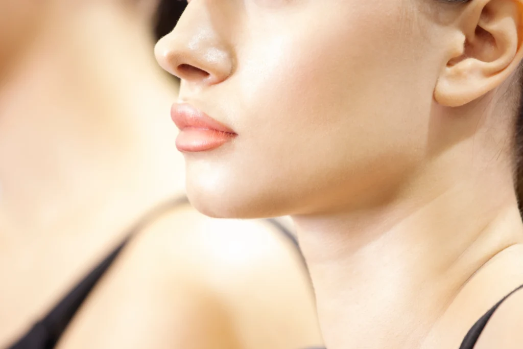 Close-up view of radiant skin after a Diamond Glow Facial treatment.